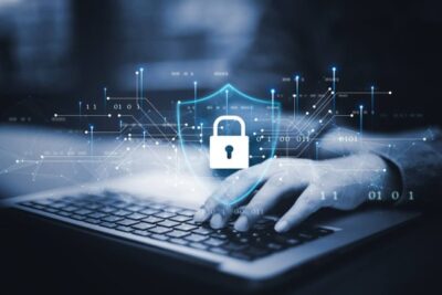 Cyber security concept showing a padlock overlay on a laptop keyboard, representing data protection, secure access and information security. Cyber security concept showing a padlock overlay on a laptop keyboard, representing data protection, secure access and information security.